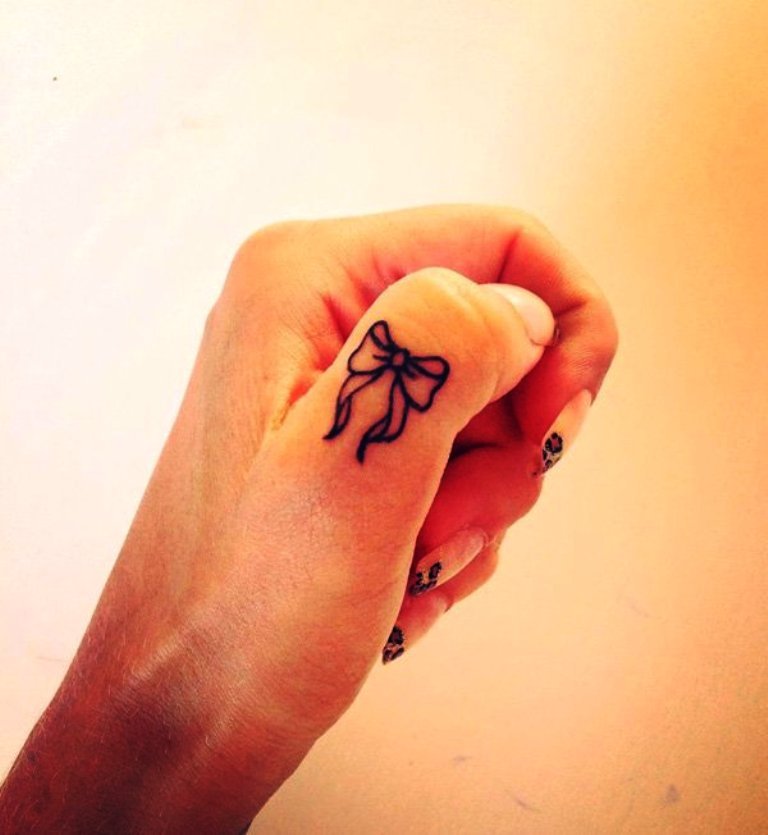 18-tiny finger tattoo designs