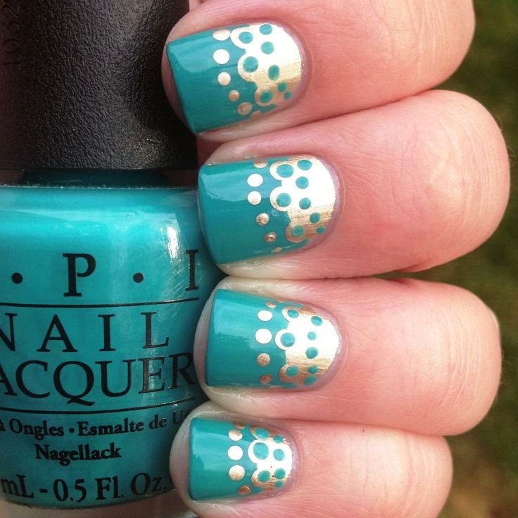 mint-nails-with-gold-metallic-polka-dots-design