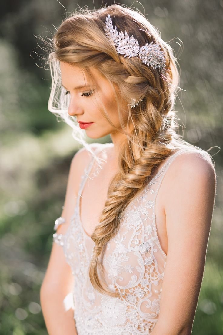 French braided wedding hairstyle with gold wing